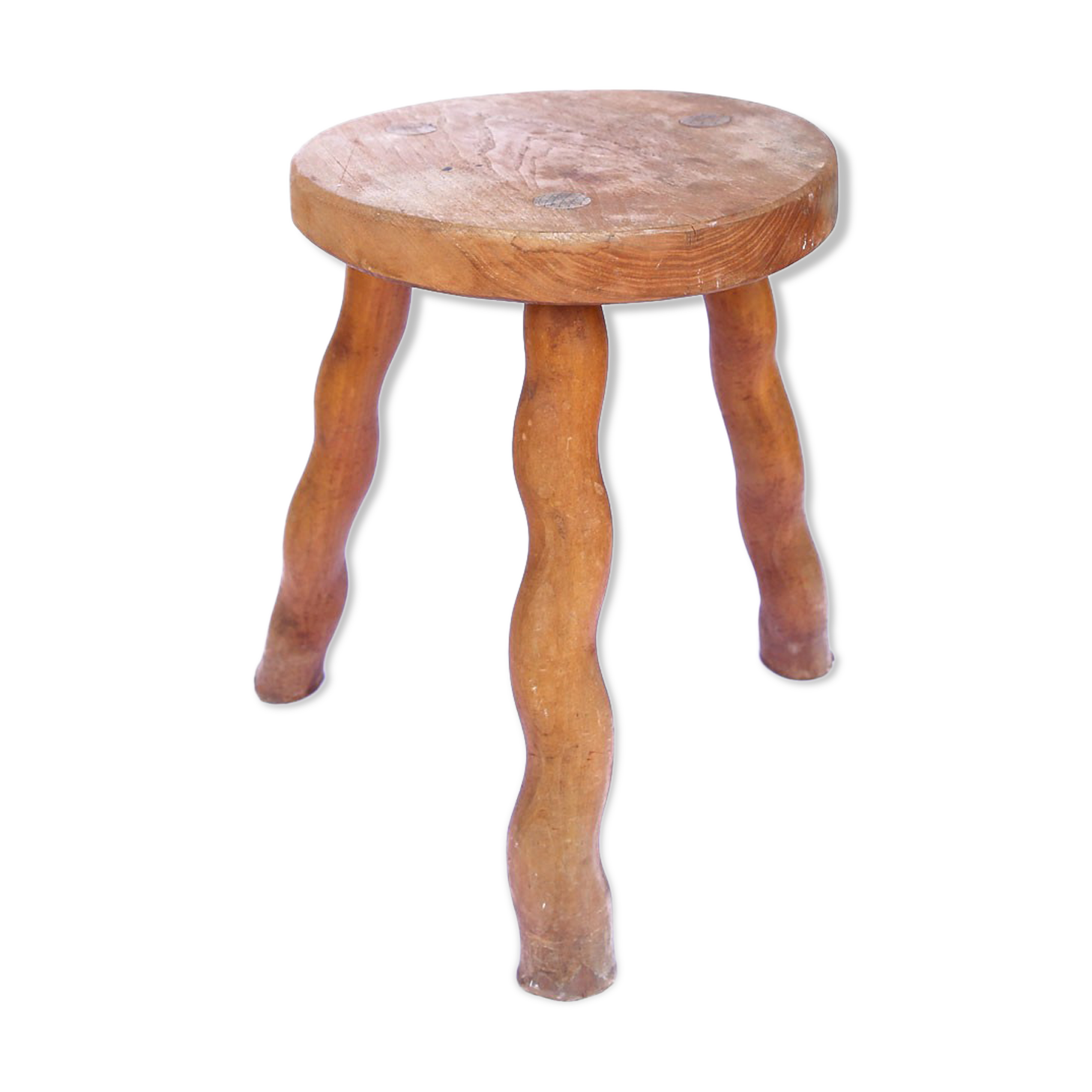 Tripod stool of folk art in light wood and wavy feet