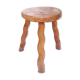 Tripod stool of folk art in light wood and wavy feet