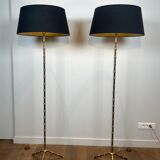 Pair of parquet floor lamps in faux-bamboo style in bronze and brass by Jacques Adnet.