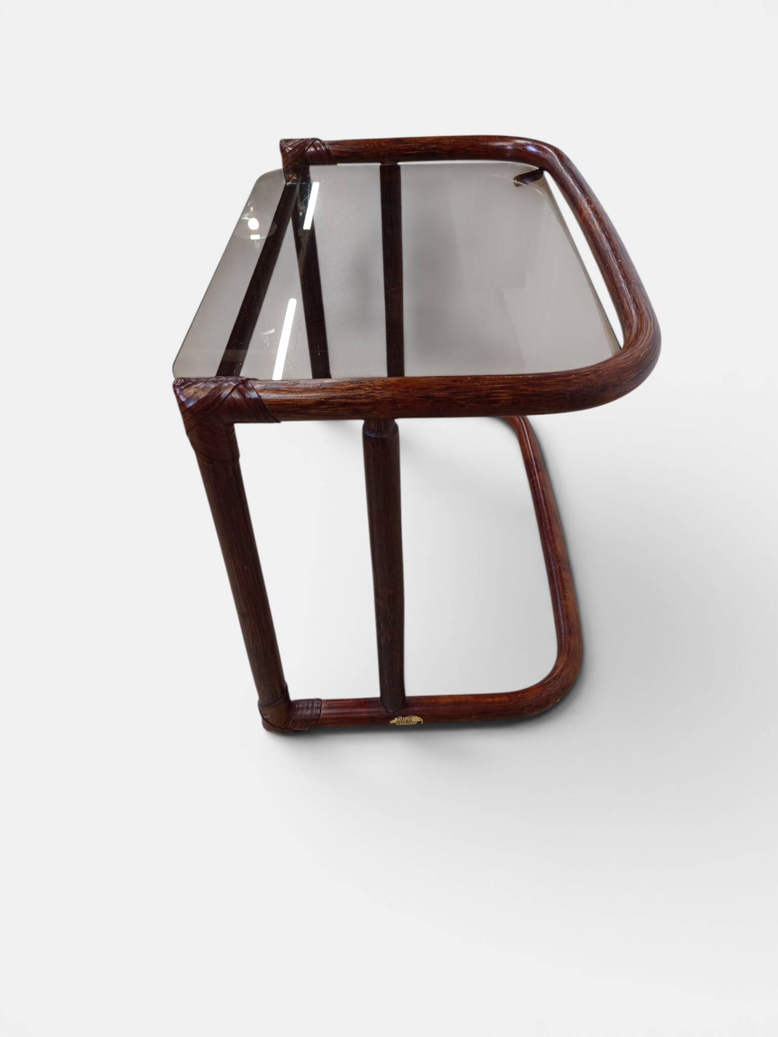 Vintage nesting tables in rattan and smoked glass by Flecht-Atelier Schütz.