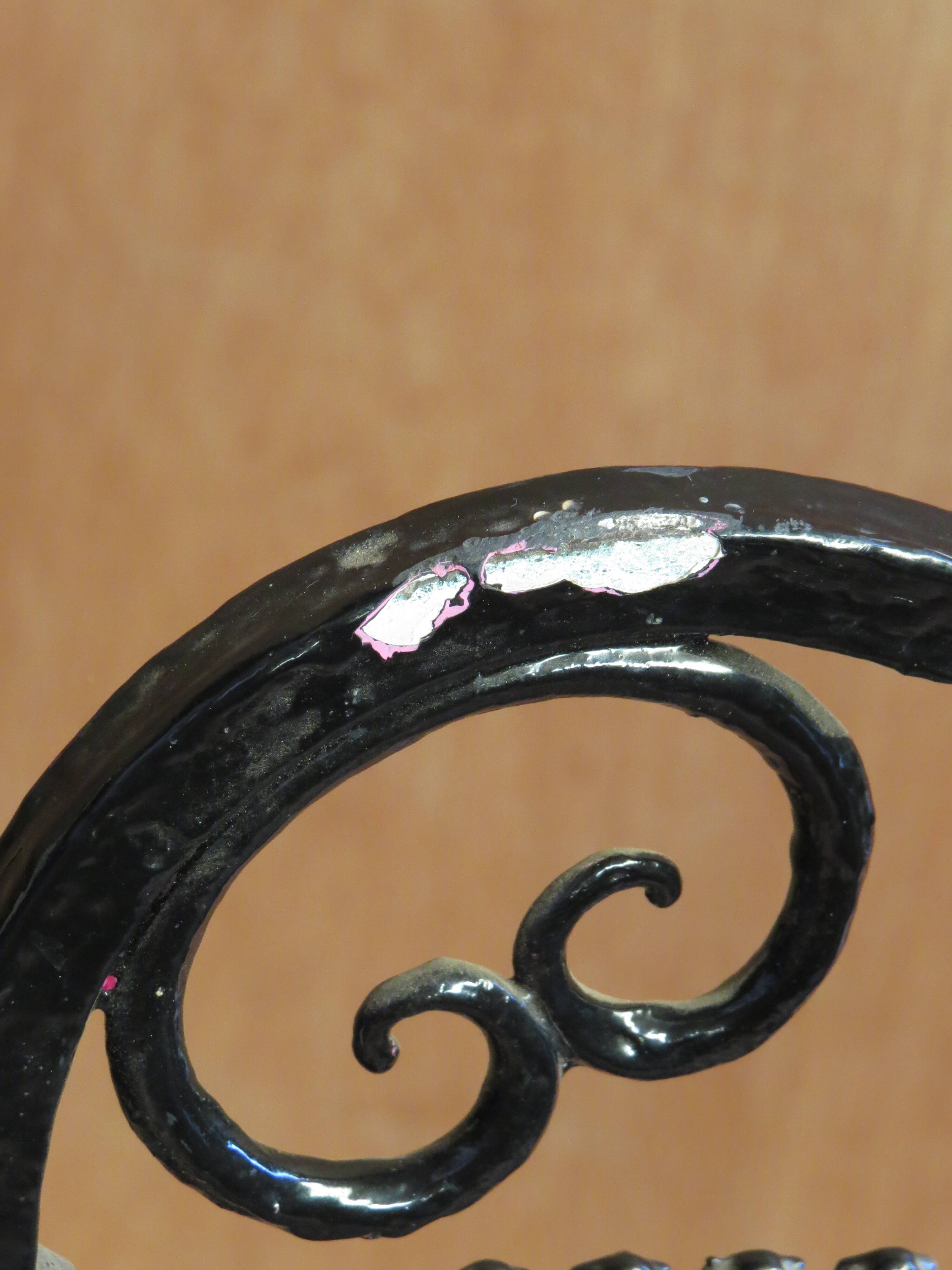 Pair of black lacquered wrought iron garden chairs