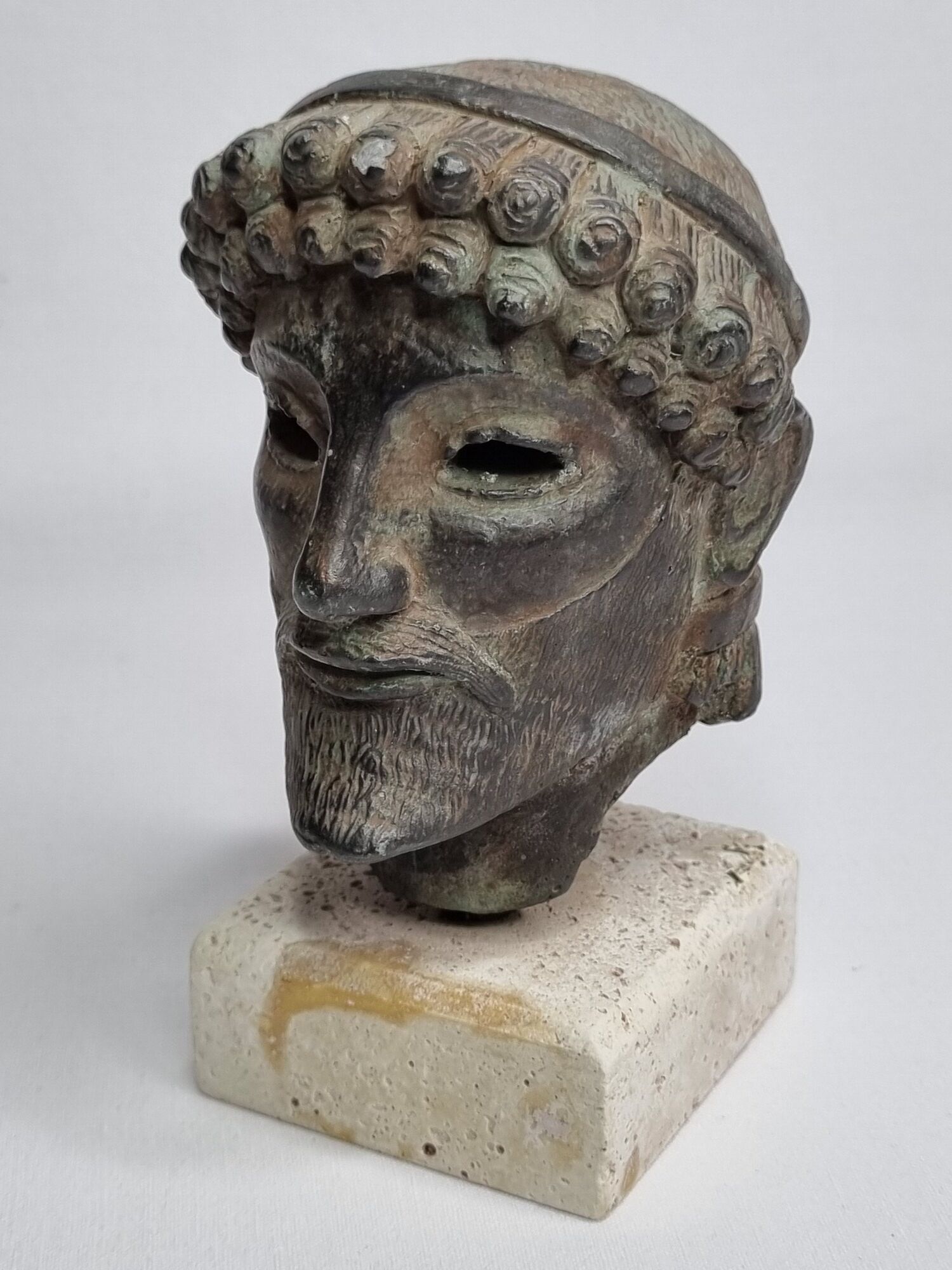 Head of Zeus in patinated plaster in imitation of bronze, 15 cm