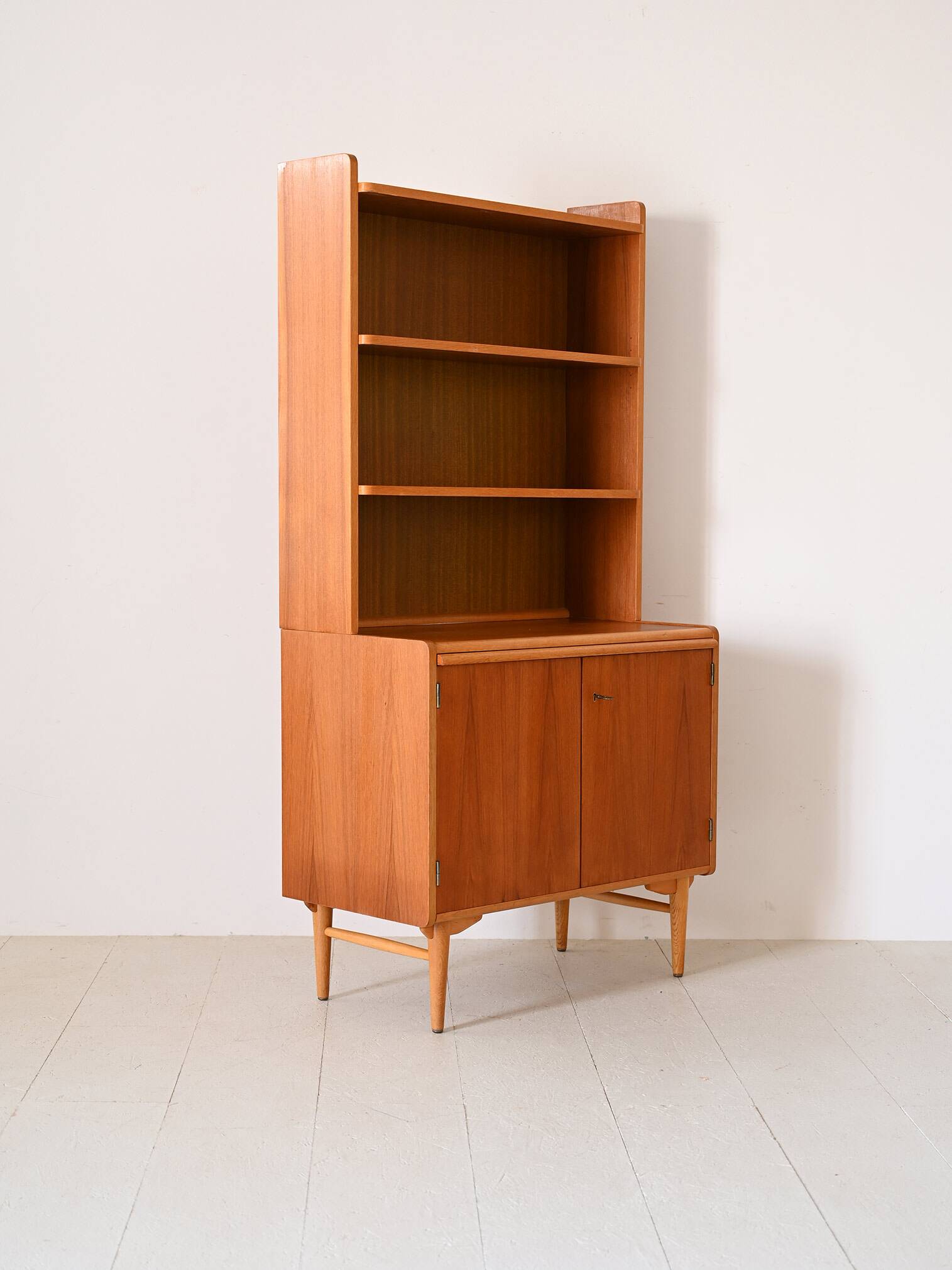 Vintage bookcase with pull-out shelf