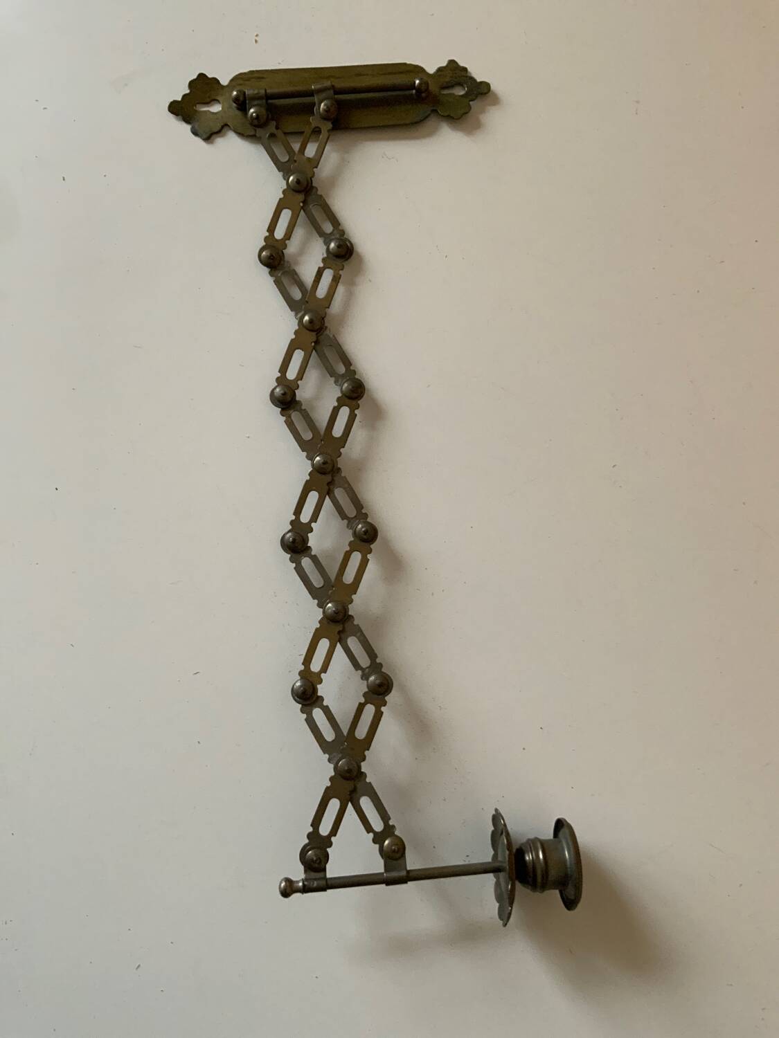 Accordion brass candle holder