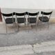 Set of 4 vintage chairs chrome and black wood