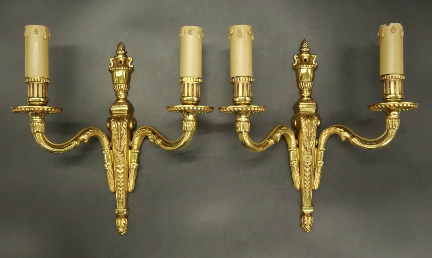 Pair of Louis XVI style urn and torch wall lights - gilt bronze