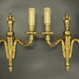 Pair of Louis XVI style urn and torch wall lights - gilt bronze