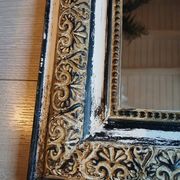 Miroir ancien avec cadre en bois sculpté 