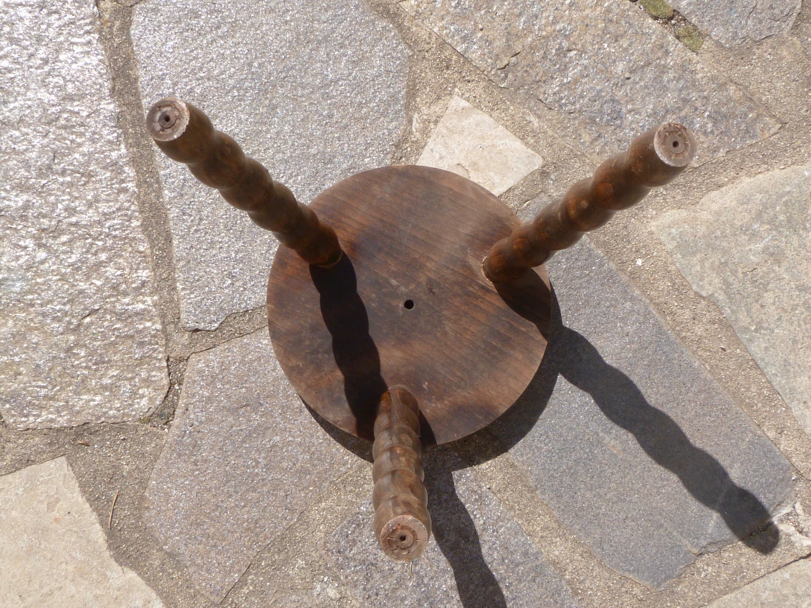Tripod stool in turned wood
