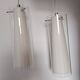 Transparent glass suspensions and white opaline glass inside.