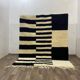 Off-white Moroccan rug with geometric patterns, 250cm x 150cm