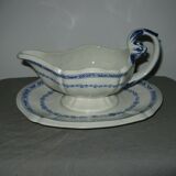 Saucière in Gien earthenware anse in the shape of a dolphin decoration garland 1900