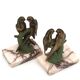 Art Deco pair of bookends with metal parrots and a marble base.