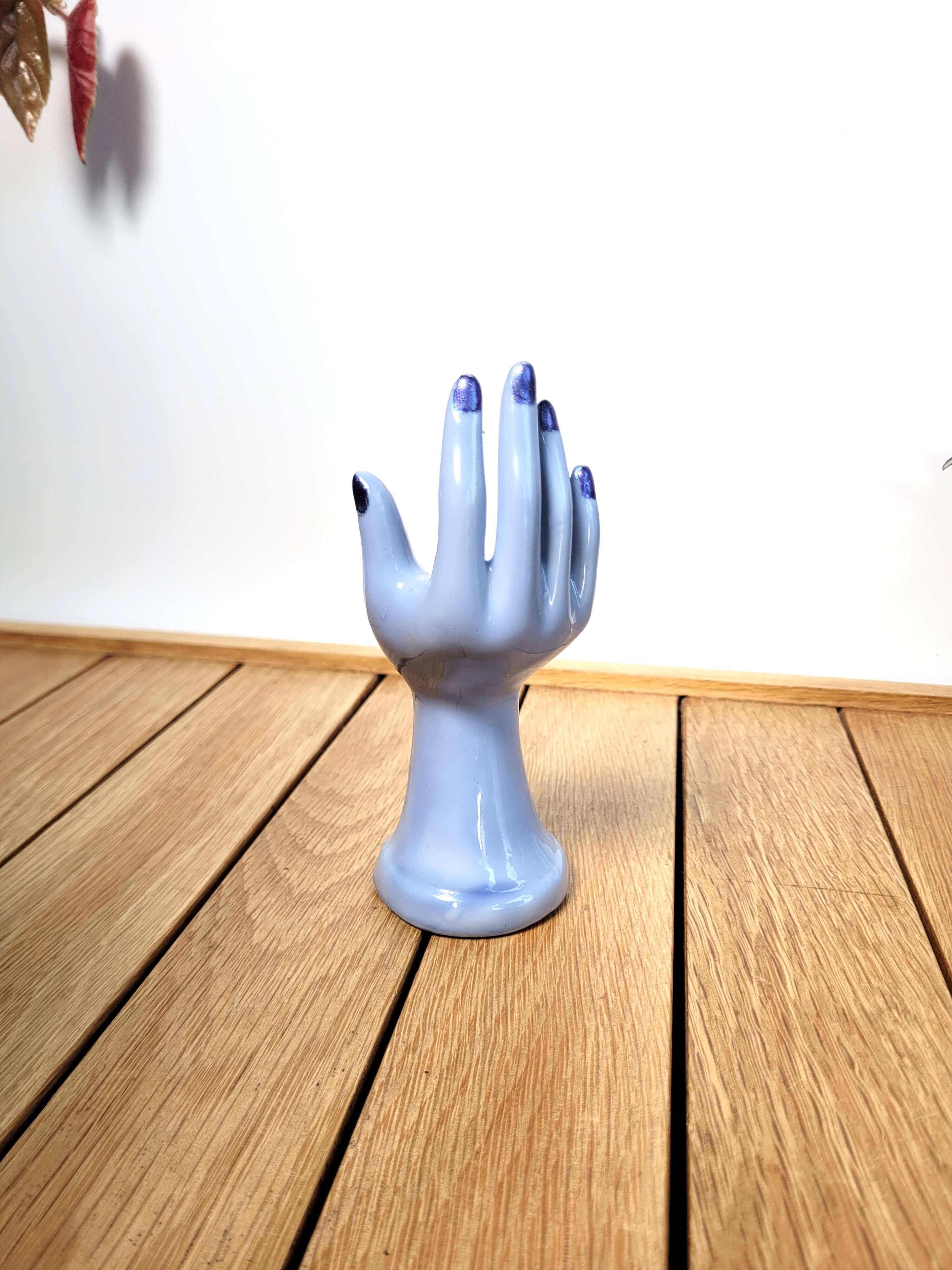 Small vintage ring sizer and purple soliflore