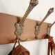 Vintage wall coat rack in patinated wood and metal – 4 double hooks