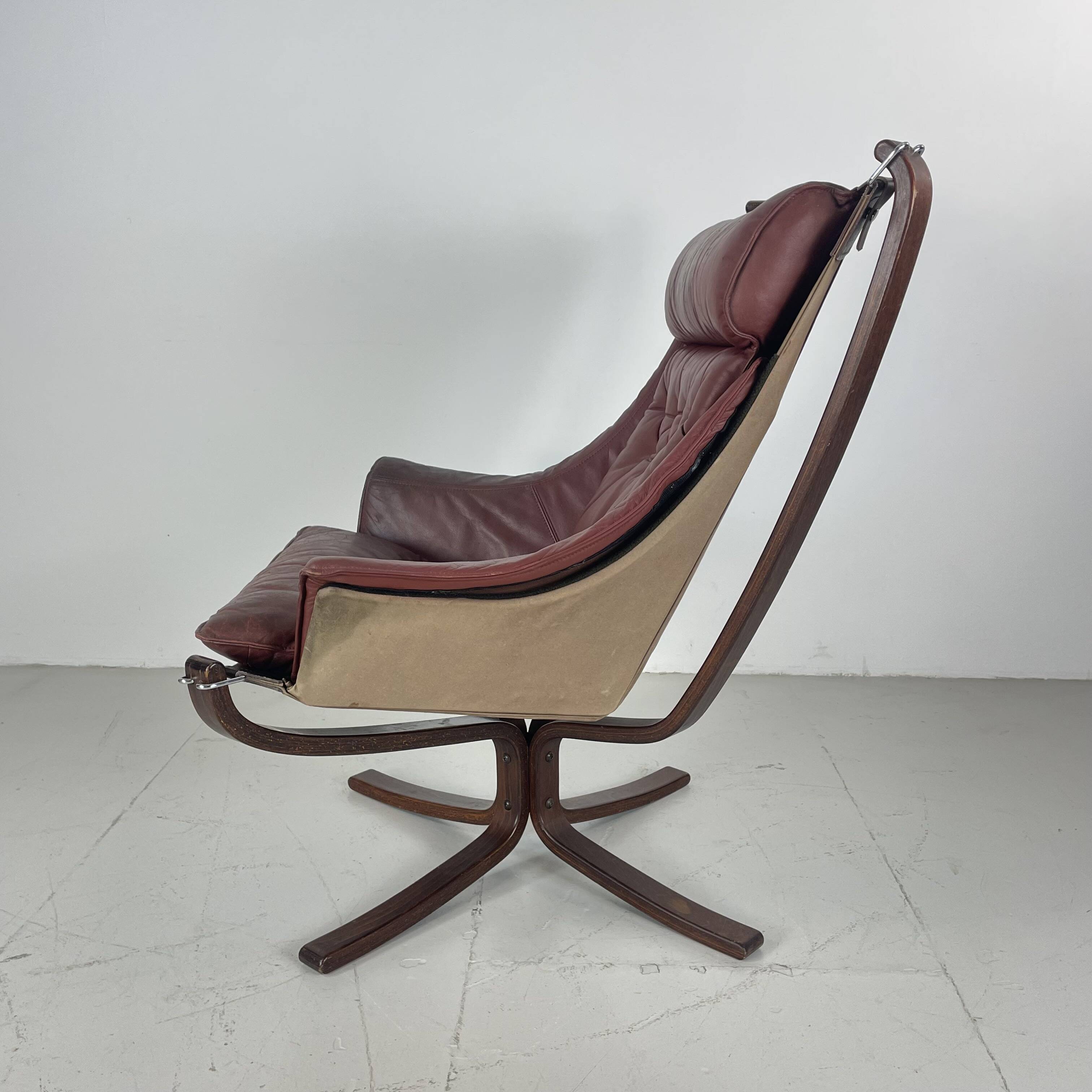 Vintage winged leather high backed Falcon chair designed by Sigurd Resell