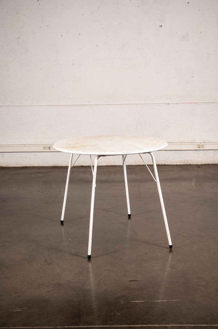 Perforated metal garden table