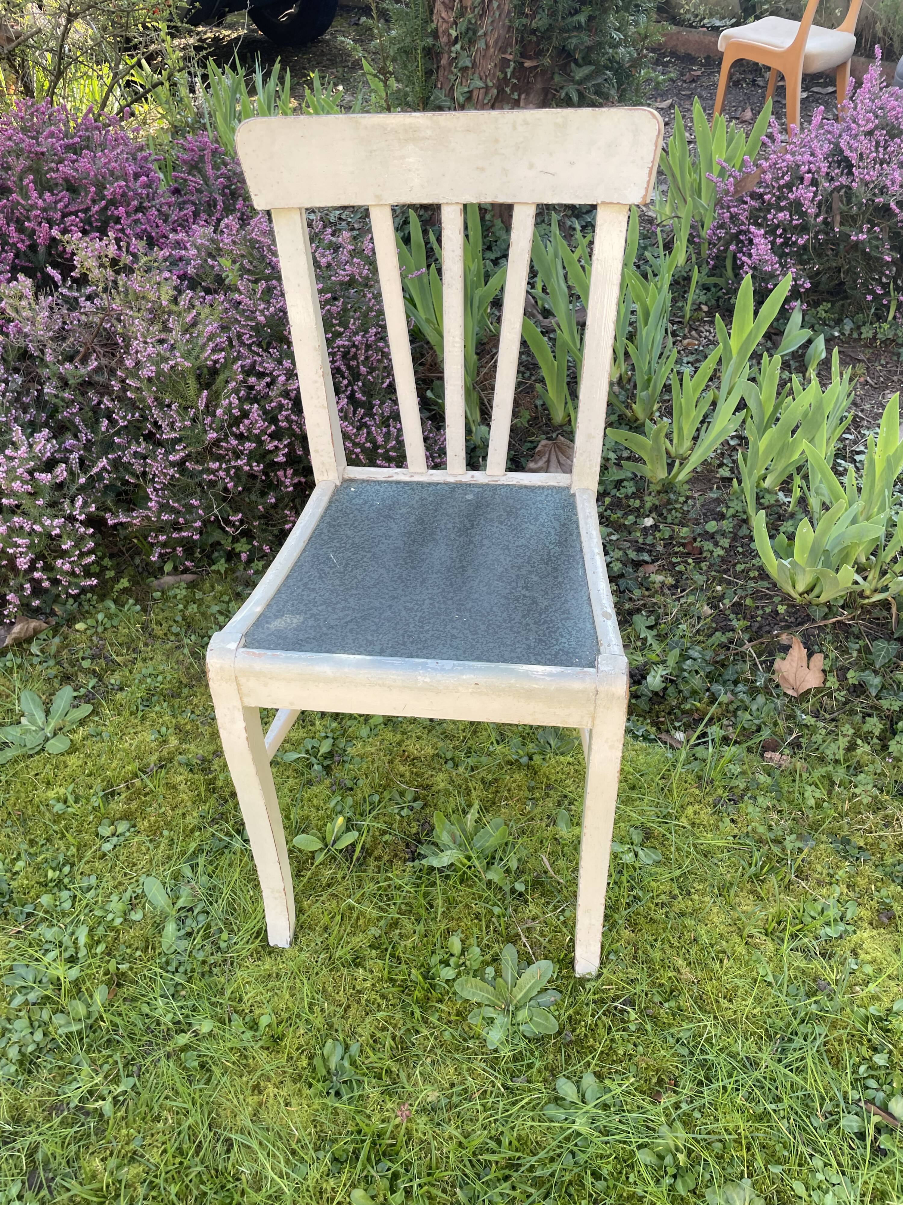 Four original 50 year retro white chairs