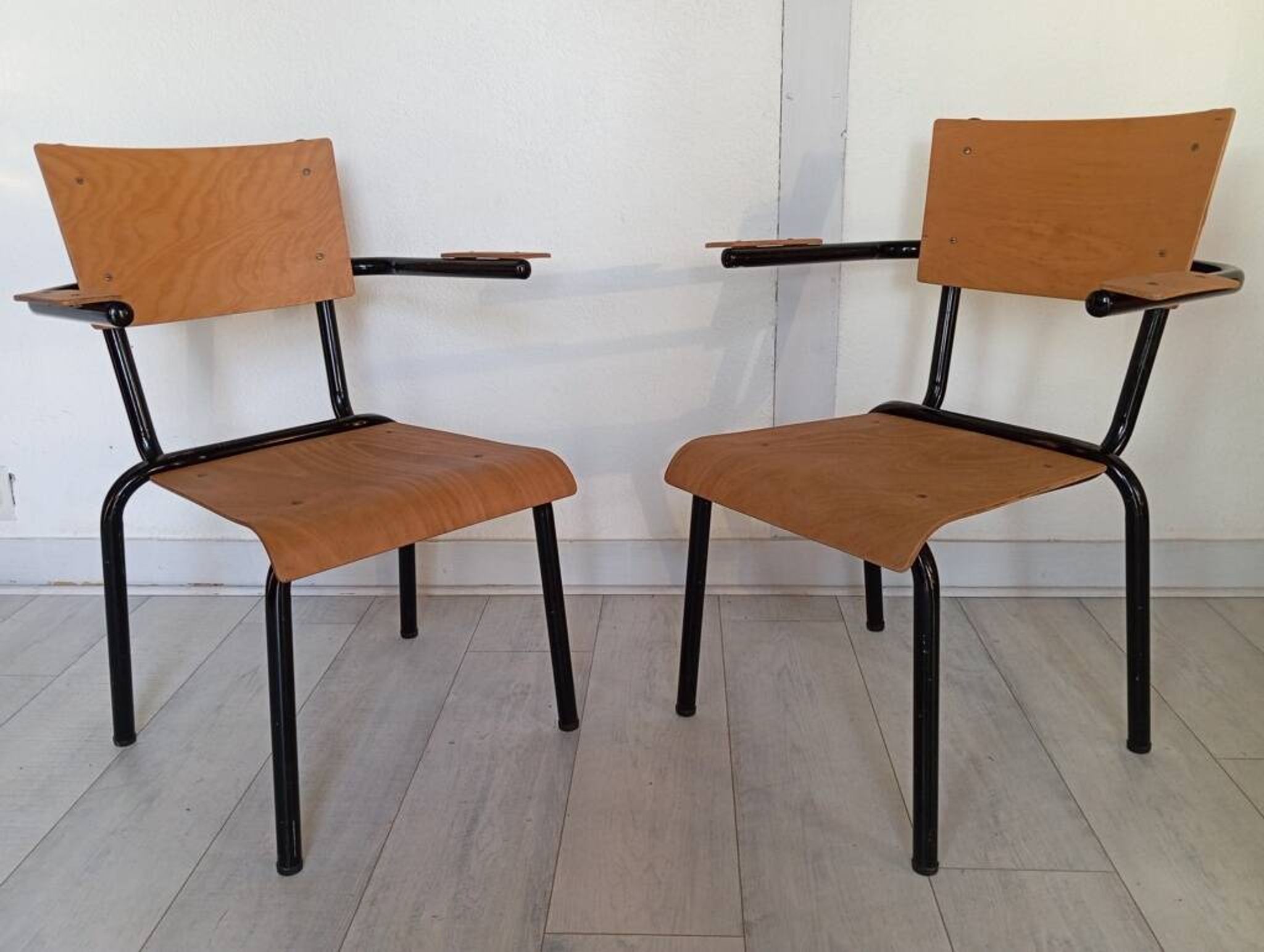Pair of tubular metal armchairs 1954