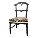 Napoleon III chair reinterpreted – Leopard seat & patinated black wood