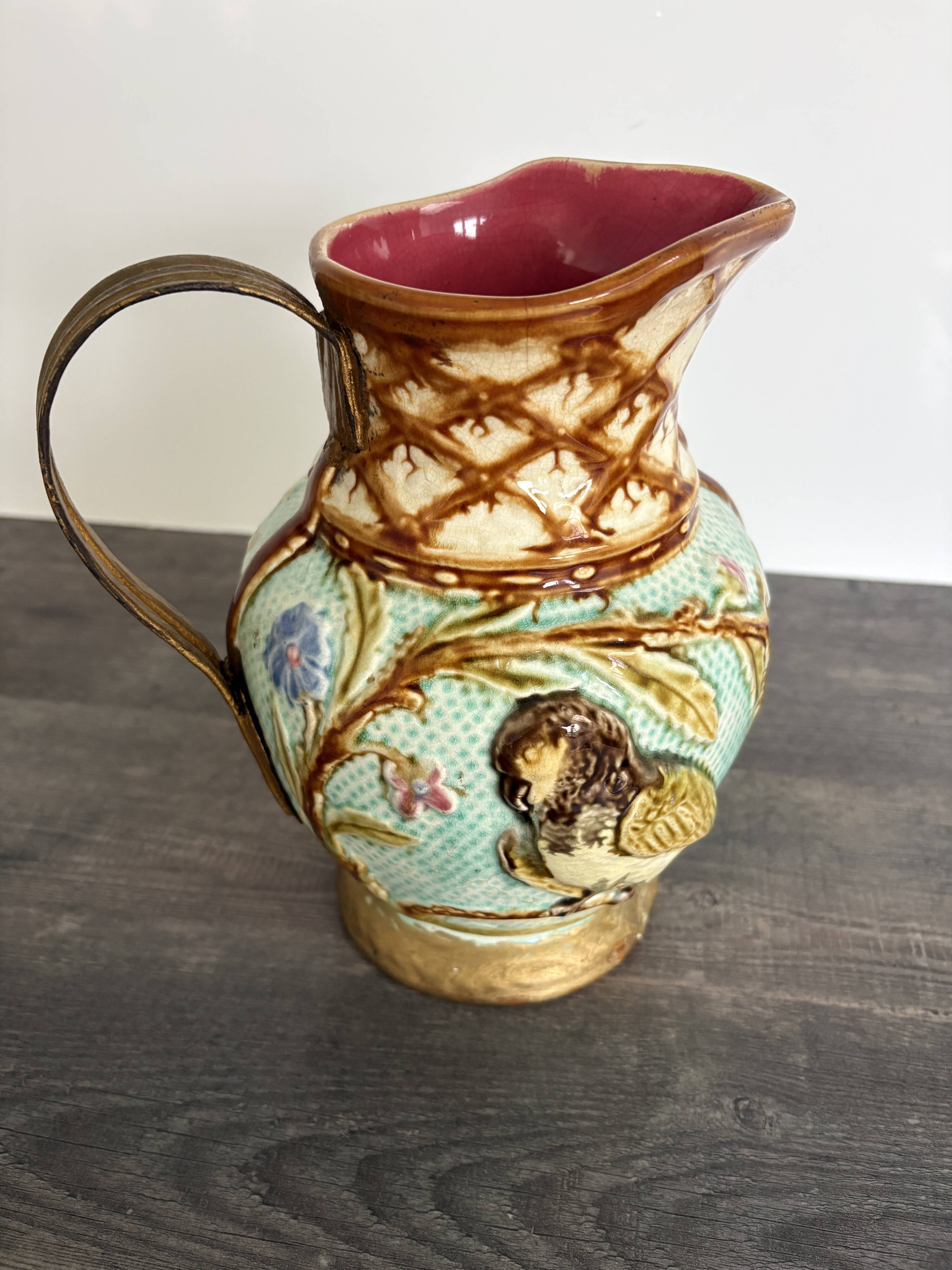 Pichet barbotine 19th century with bird decoration.