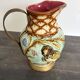 Pichet barbotine 19th century with bird decoration.