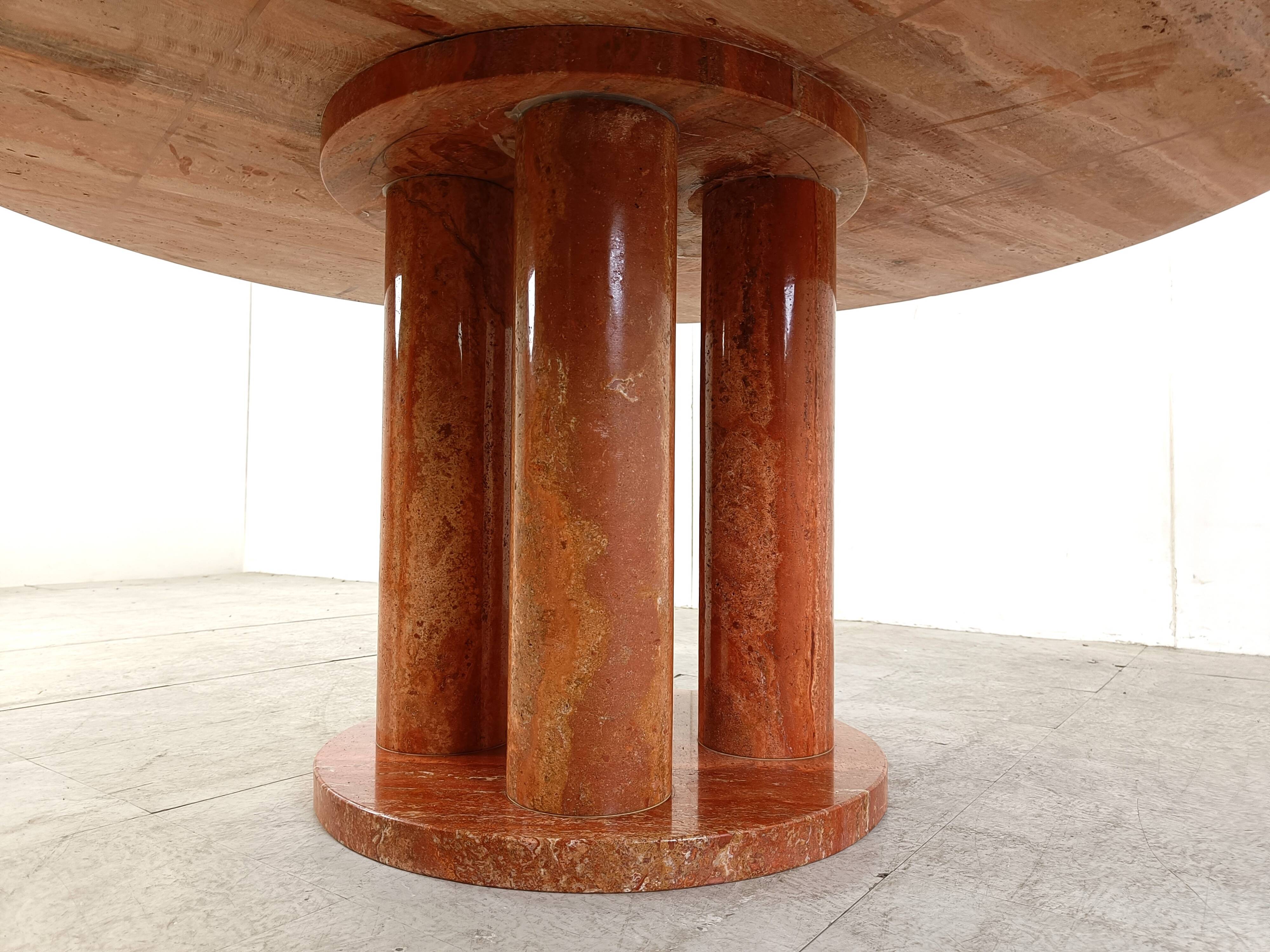 Large round red travertine dining table, 1970s