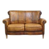 Vintage sheep leather 2 seater sofa with patina