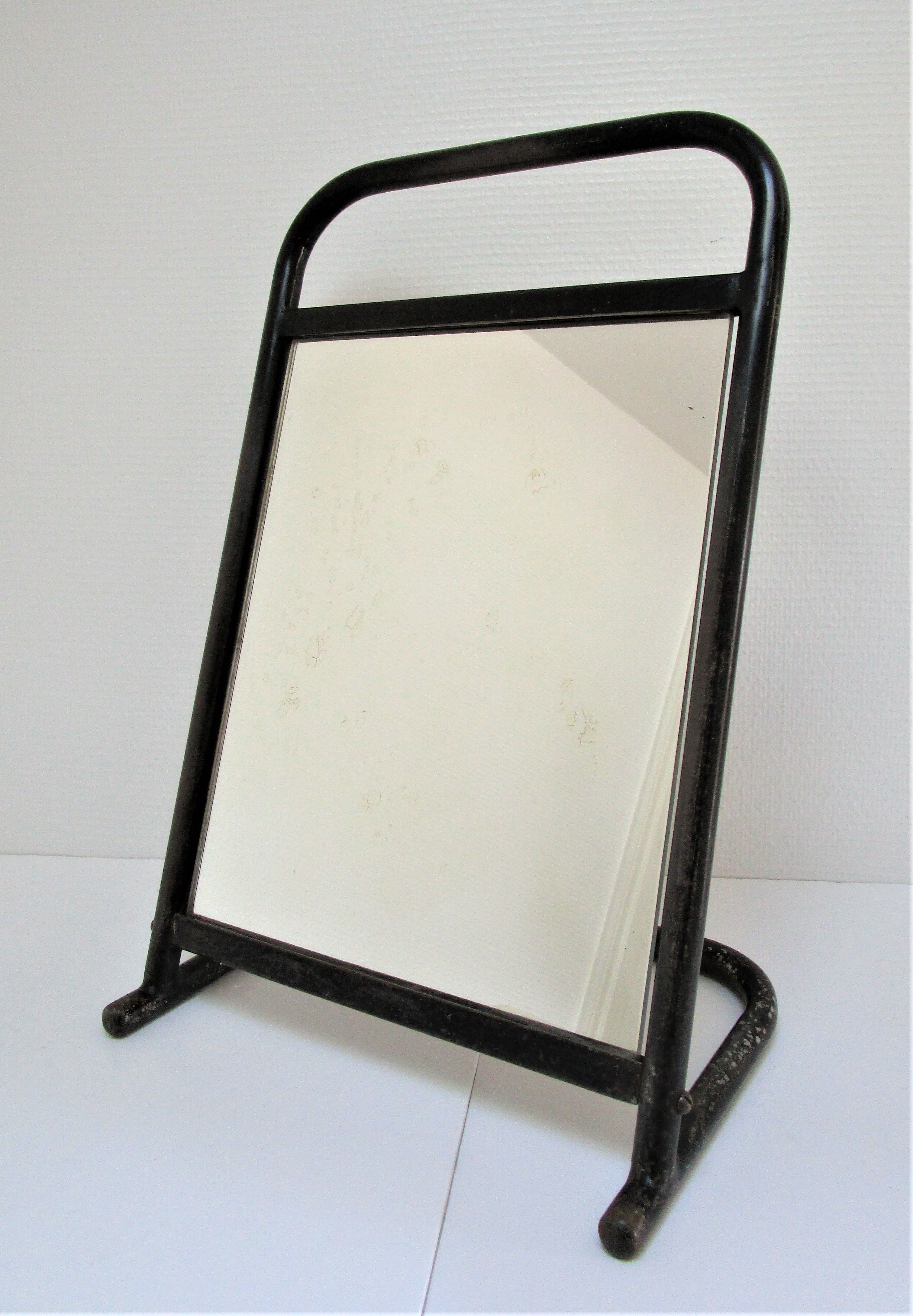 Vintage patinated metal shoe mirror