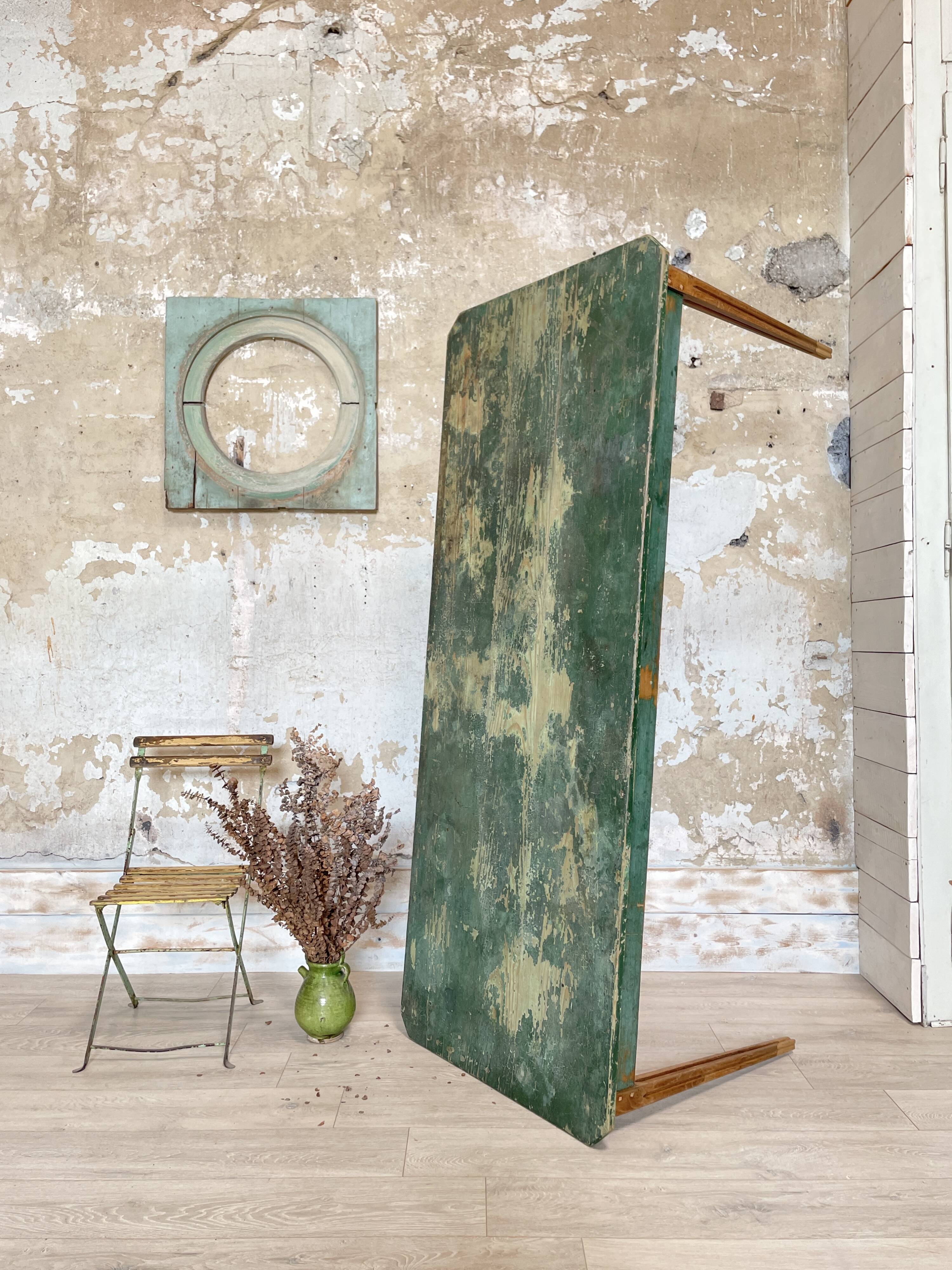 Vintage farm table with spindle legs.