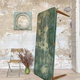 Vintage farm table with spindle legs.