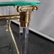 Pair of tables in brass, acrylic and glass