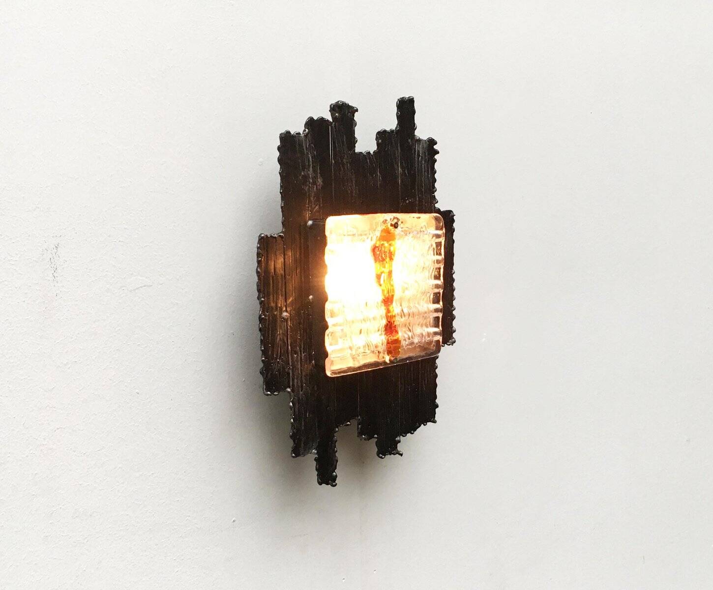 Vintage Italian brutalist wall light in wrought iron by Albano Poli for Poliarte, set of 2.