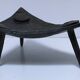 Brutalist metal pocket with patinated tripod