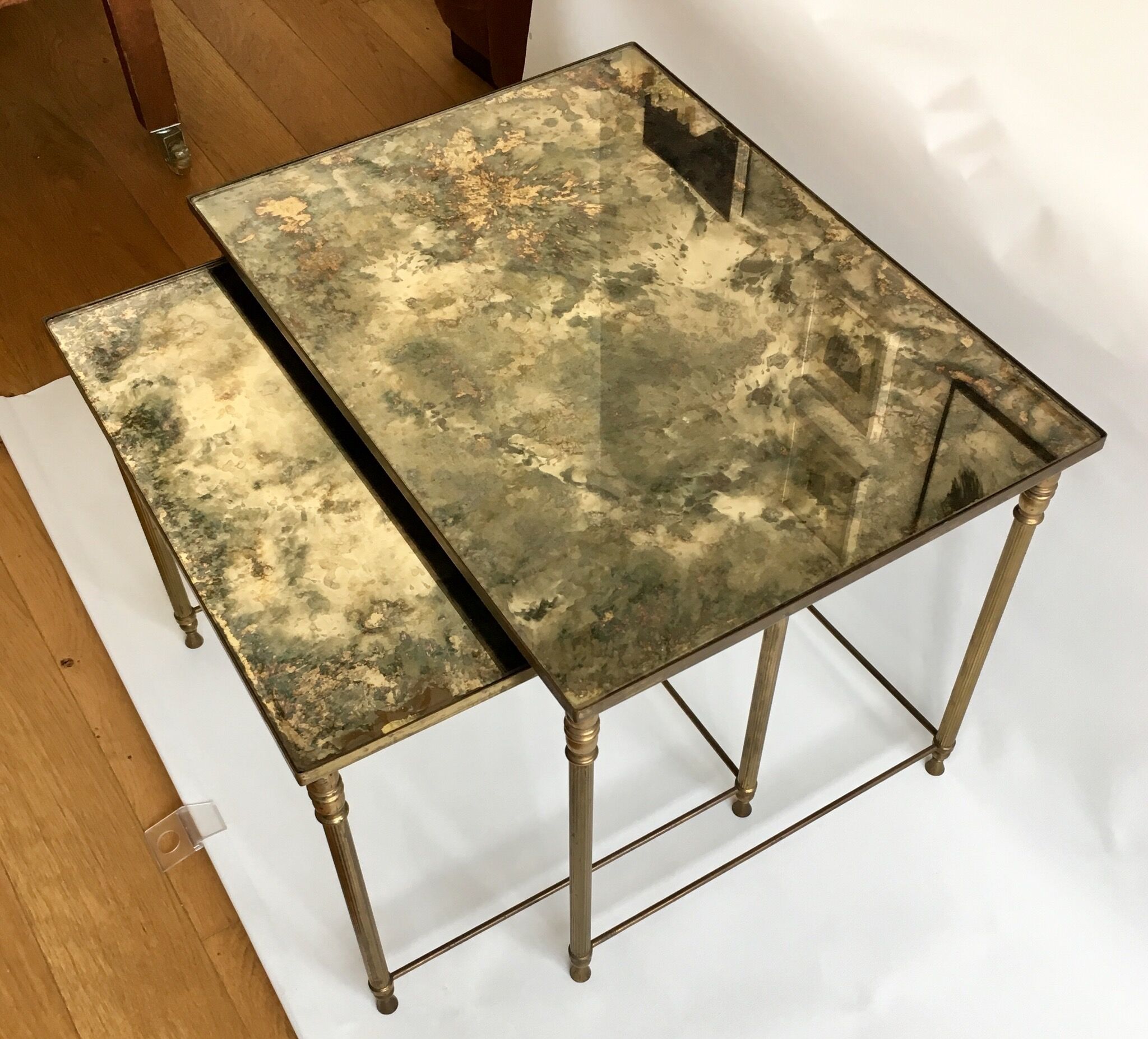 Brass and glass mirrored nesting tables