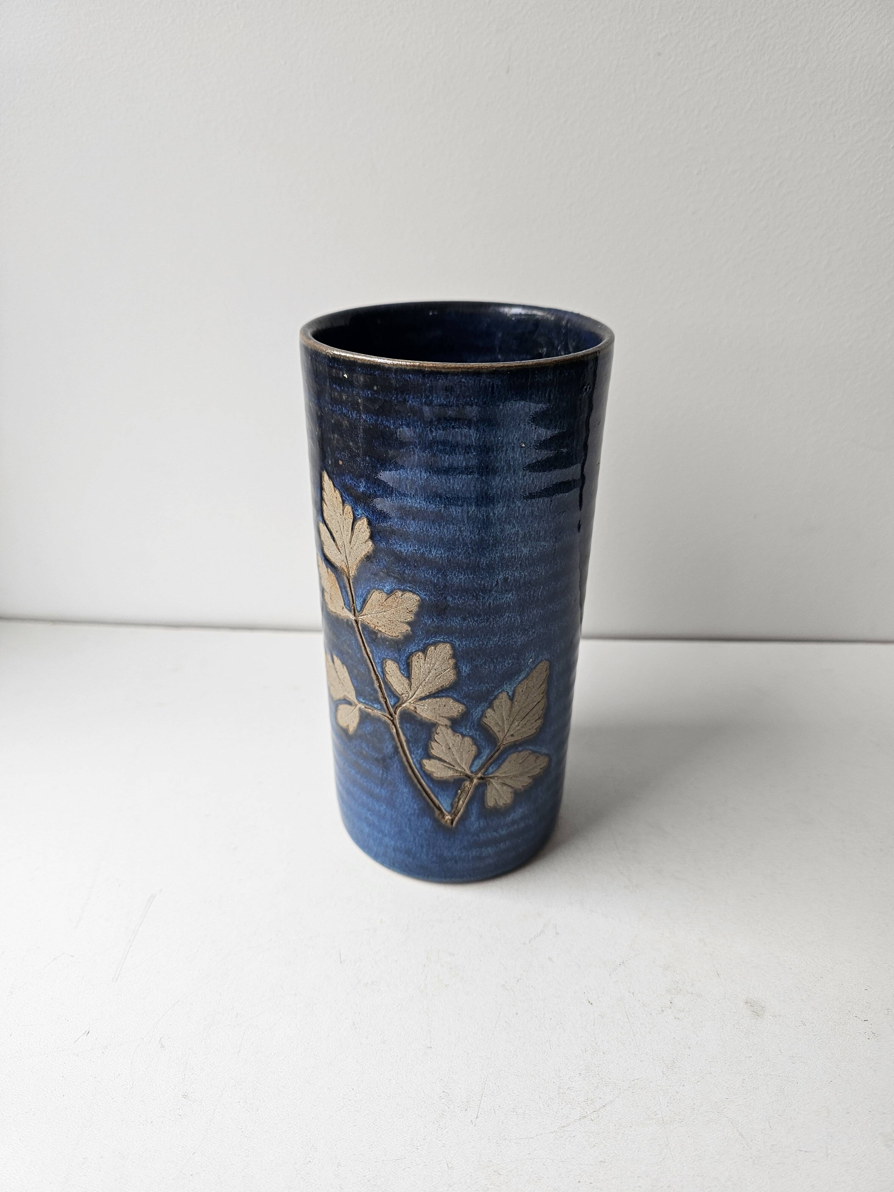 Blue ceramic vase with roller signed AB (signature to be identified)