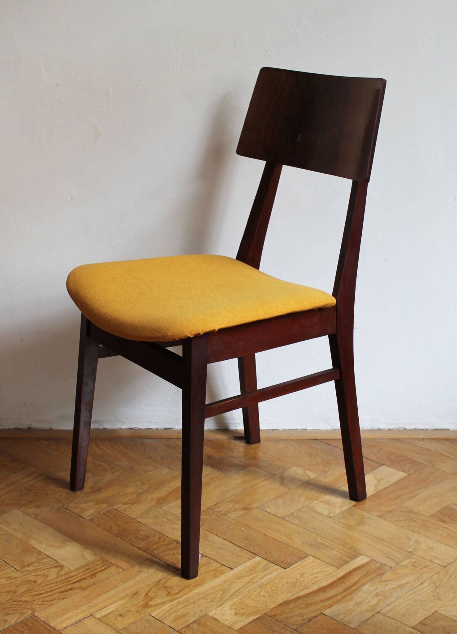 Vintage dining chair from the 1960s, Scandinavian style, wood and fabric.