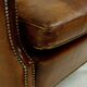 Fauteuil en cuir de mouton patiné années 1950