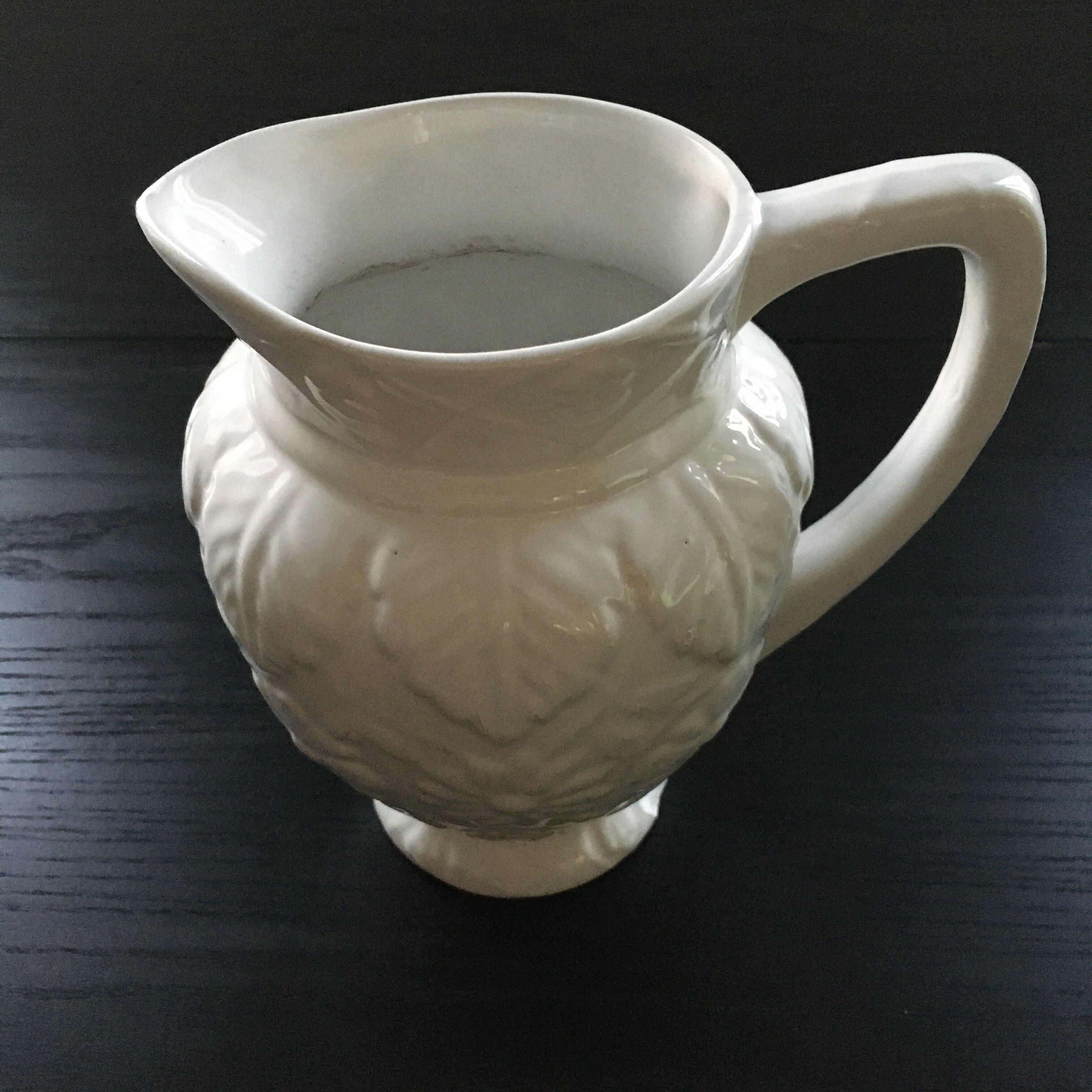 White slipware pitcher