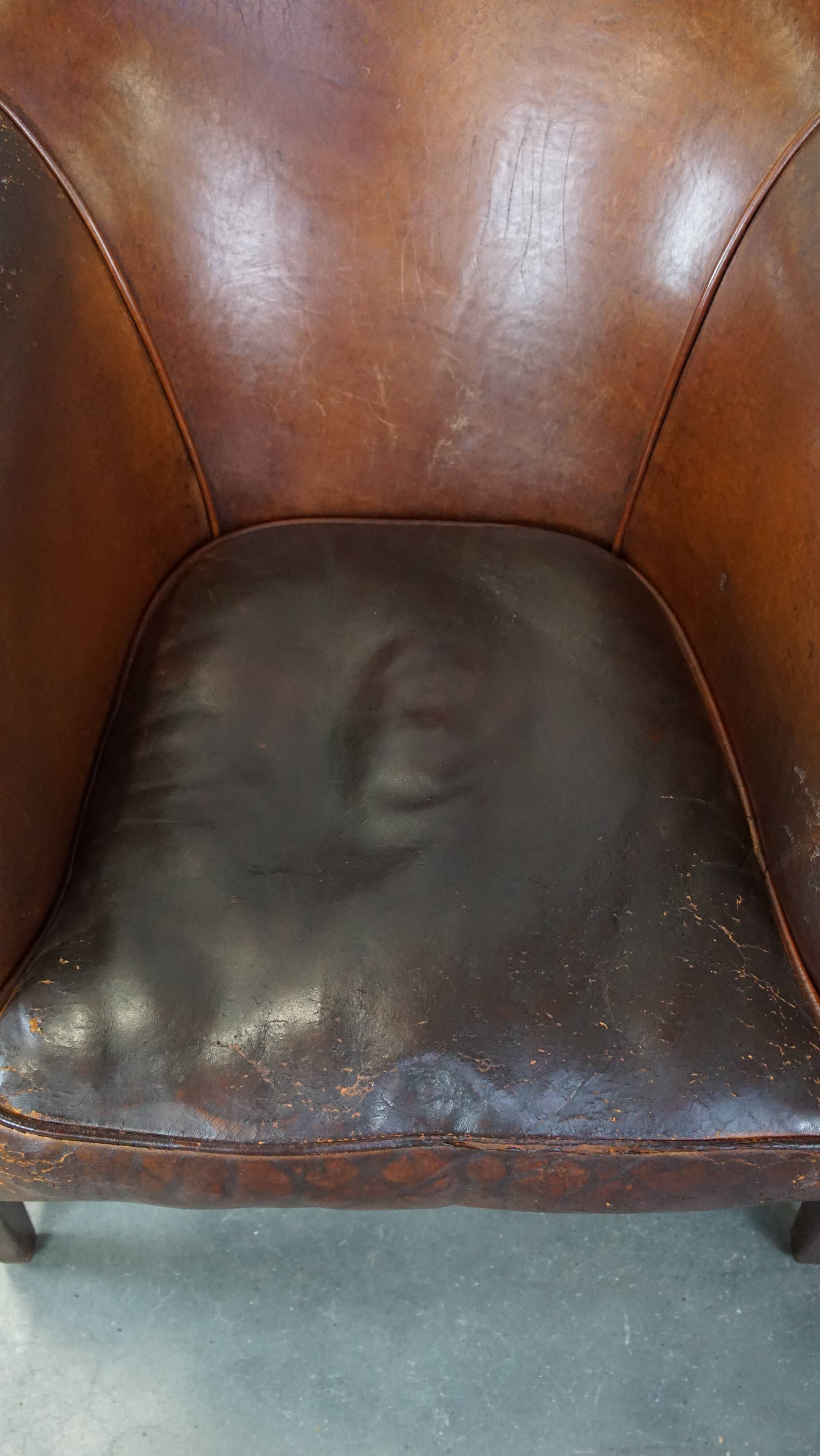 Vintage club armchair in sheepskin leather