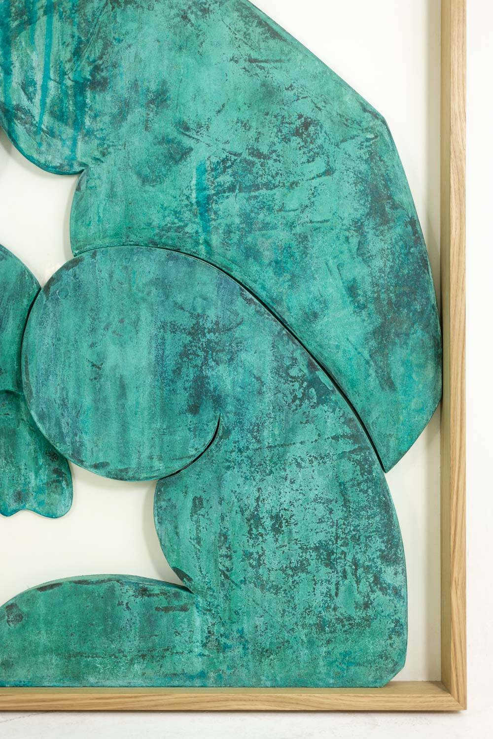 “The Twins”, bas-relief framed in oak wood and patinated copper.