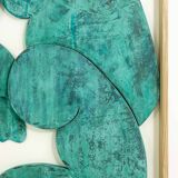 “The Twins”, bas-relief framed in oak wood and patinated copper.