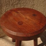 Brutalist tripod stool from the 50s in wood.