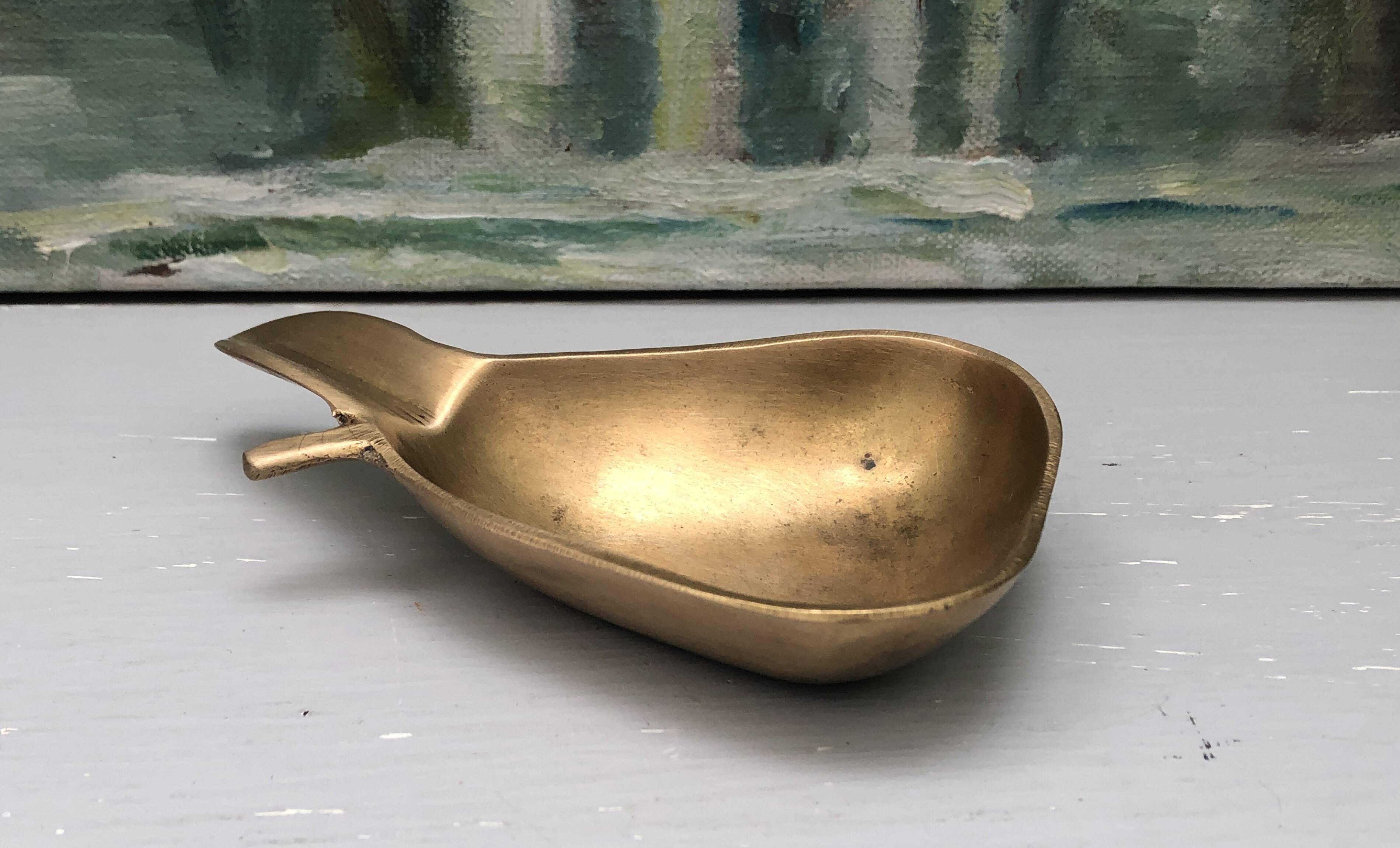 Vintage brass ashtray in the shape of a fruit, pear
