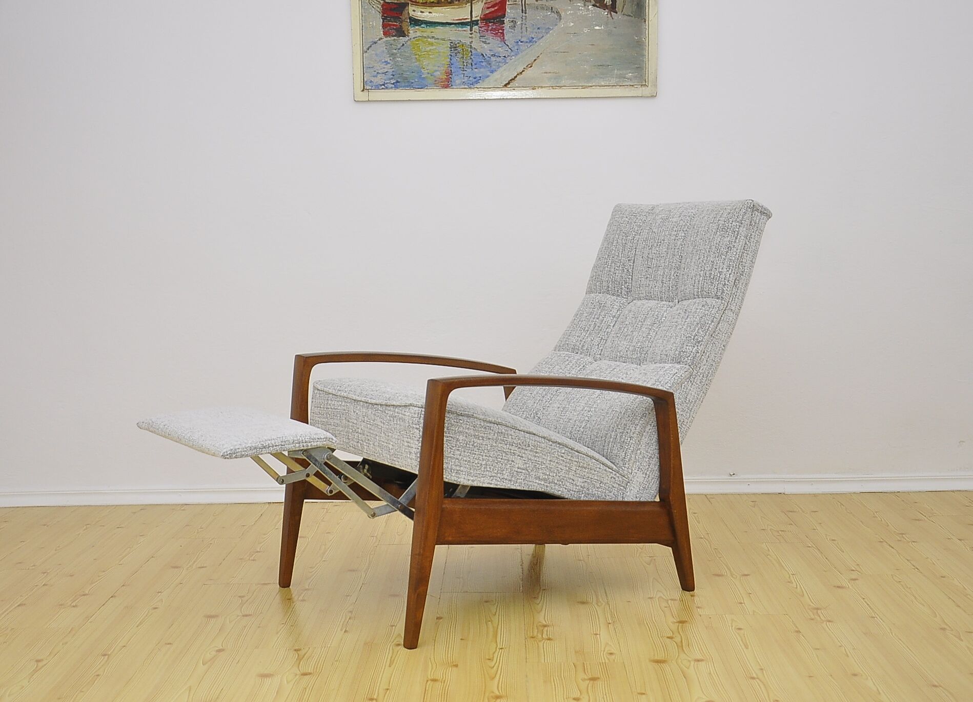 Mid-century armchair with folding footrest, 1960s