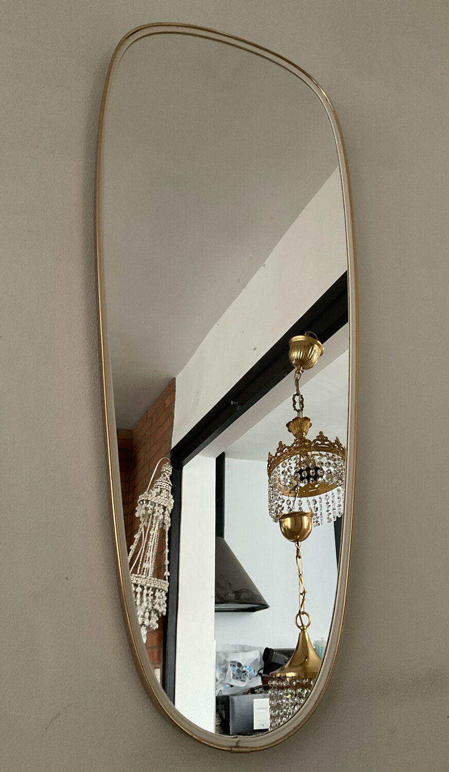 Asymmetrical free-form mirror from the 60s