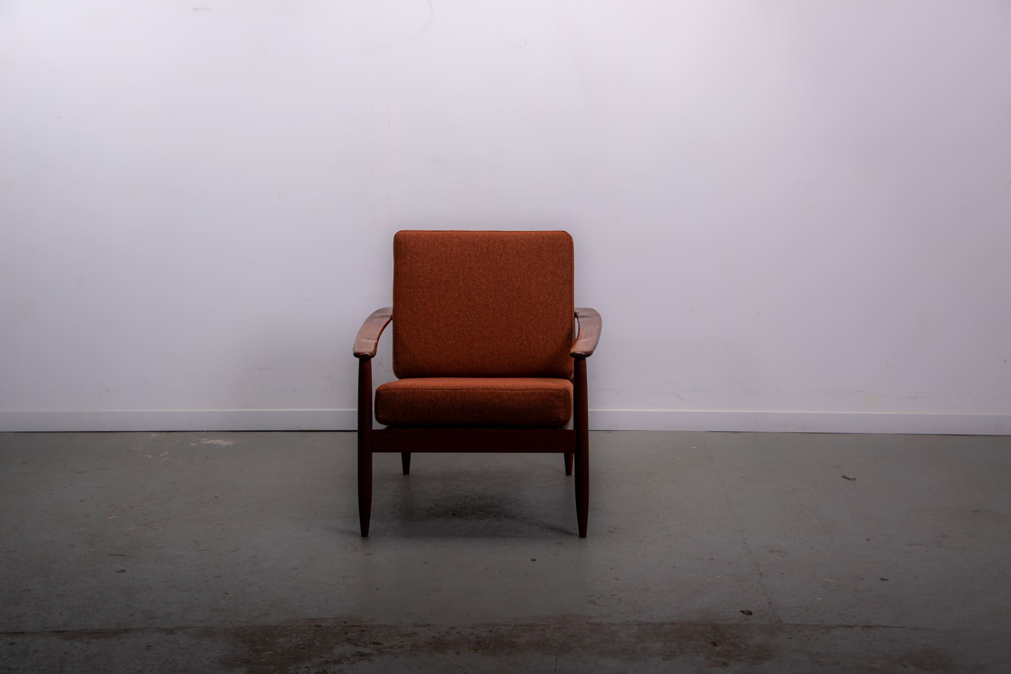Mid-century easy chair in teak and cane circa 1970