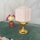 Art Deco lamp from the 1930s with an opaline globe featuring a pink flower.