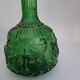Empoli green glass bottle, zodiac signs