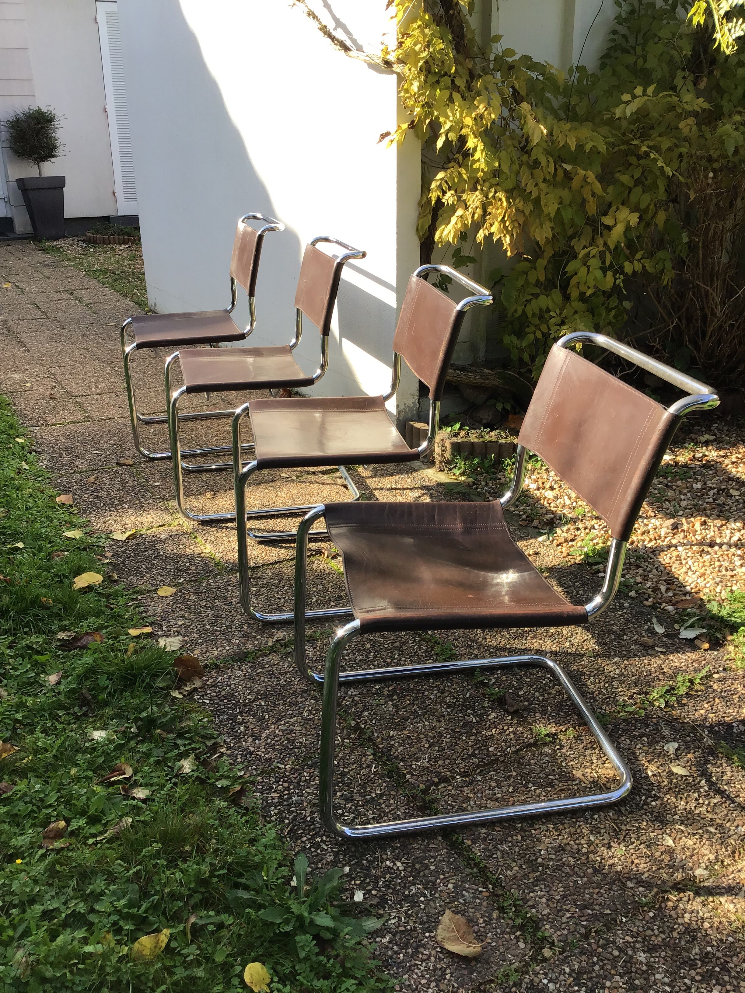 Suite of four S33 chairs